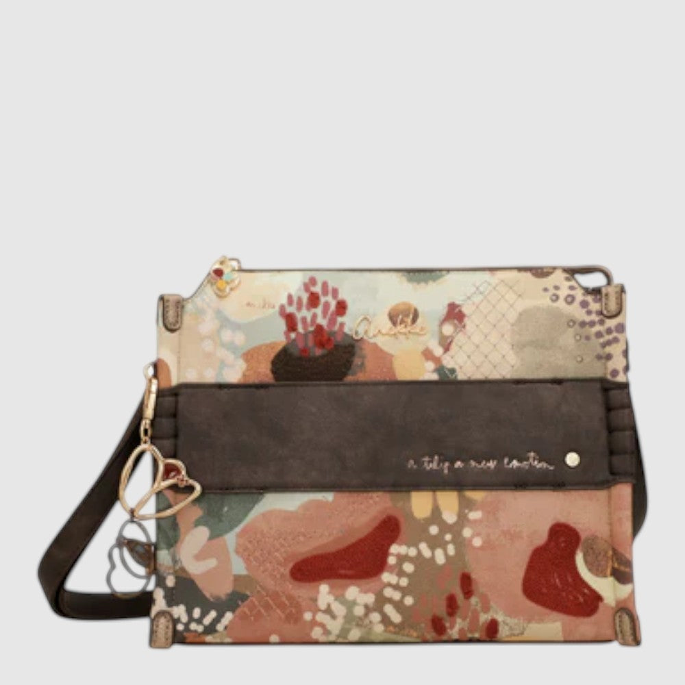 Carry your essentials in style with the Anekke 43713-577 Multi crossbody handbag. This bag is perfect for everyday adventures. Whether you're running errands or heading out with friends, the playful multi-colored design adds a fun pop to any outfit!