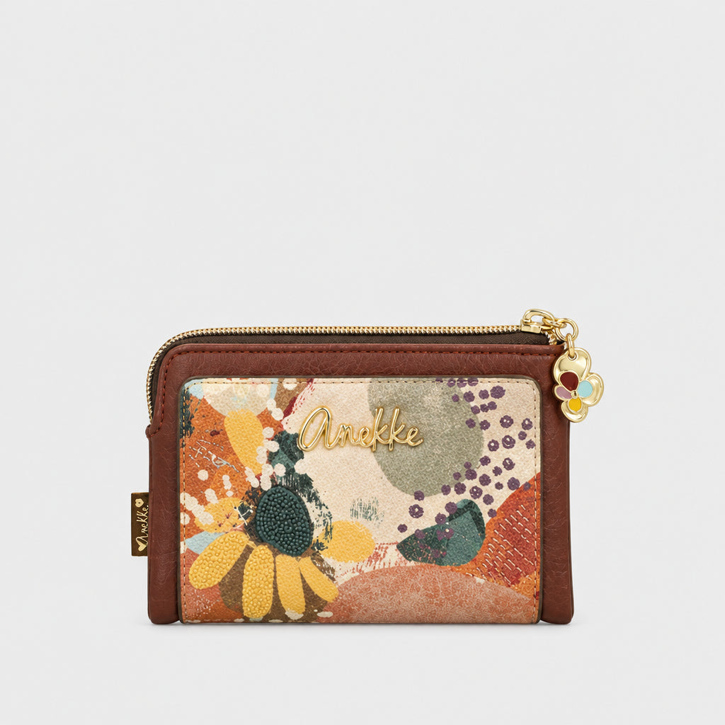 Keep your essentials organized in style with the Anekke 43719-912 wallet. This compact wallet packs serious functionality with multiple card slots, a convenient snap closure, and a zippered coin pocket for secure storage. Perfect for everyday carry - slip into any bag or pocket while holding everything you need.