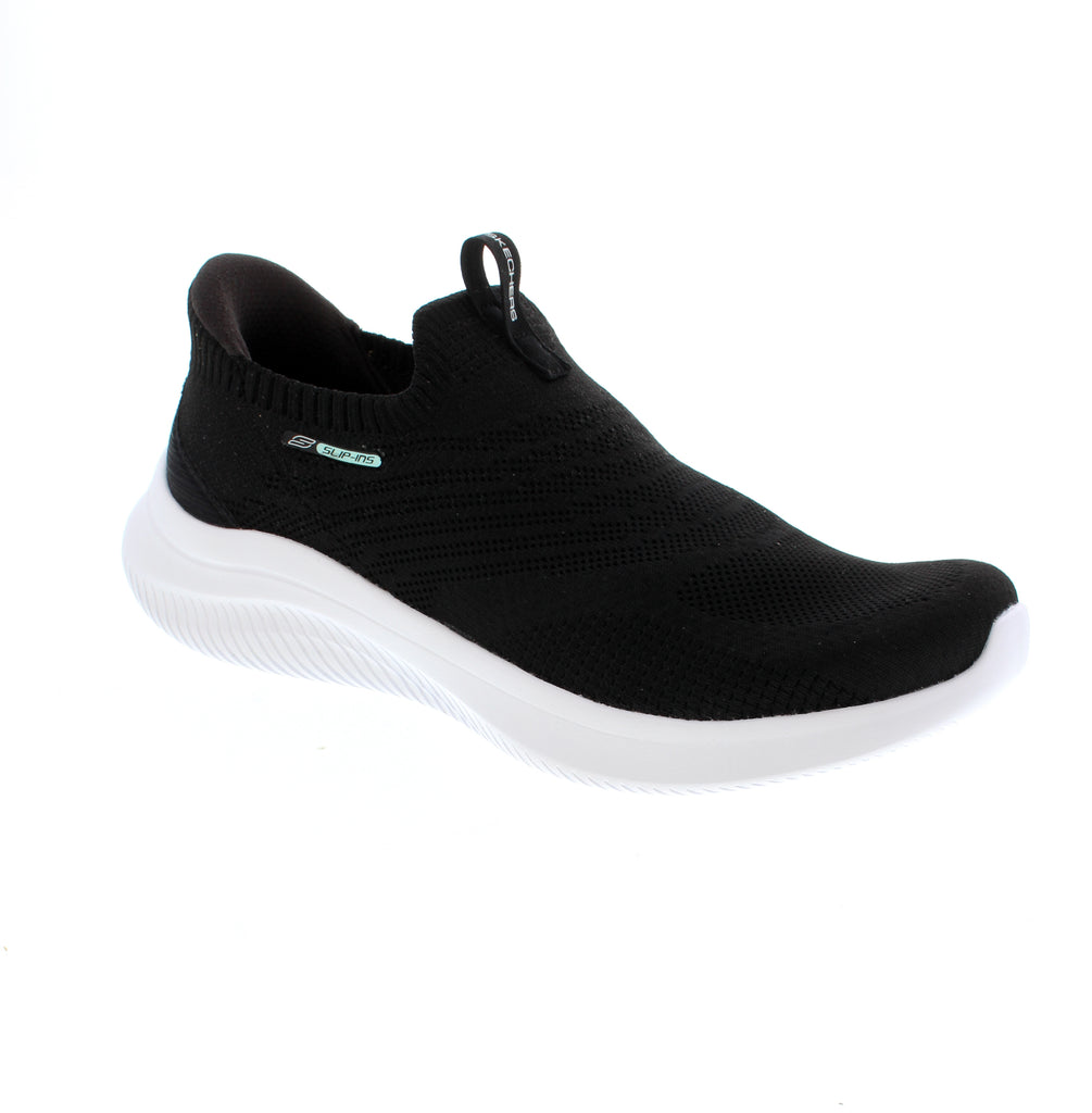 The Skechers Ultra Flex 4.0 150802-BLK in black combines style with everyday comfort. This step-in features a fabric upper, memory foam midsole, and removable microfiber insole for cushioned support. The almond toe and white sole create a modern athleisure look perfect for walking and casual wear. Vegan-friendly, machine washable, and orthotic-friendly for year-round versatility.