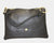 Elevate your everyday routine with the versatile and chic The Trend 136580 shoulder bag. With its abundance of pockets, adjustable straps, and detachable strap, this bag offers both practicality and fashion-forward design. It's the perfect accessory for any event, keeping you effortlessly organized and hands-free.
