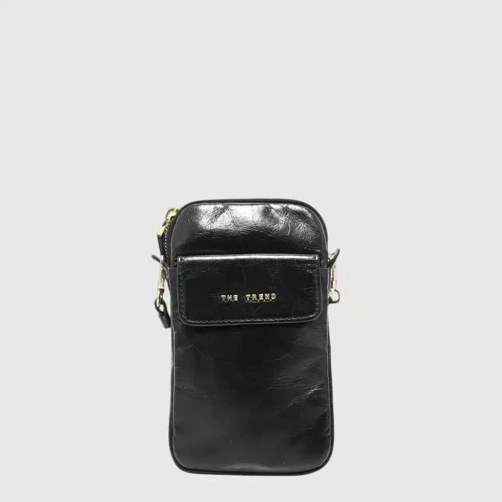 Stay on trend with The Trend 1765502! This fashionable crossbody cellphone bag holds all your on-the-go essentials - plus, no more bulky bags weighing you down. Keep your wallet, keys, and phone together in style - just enough room for the luxury of light packing.