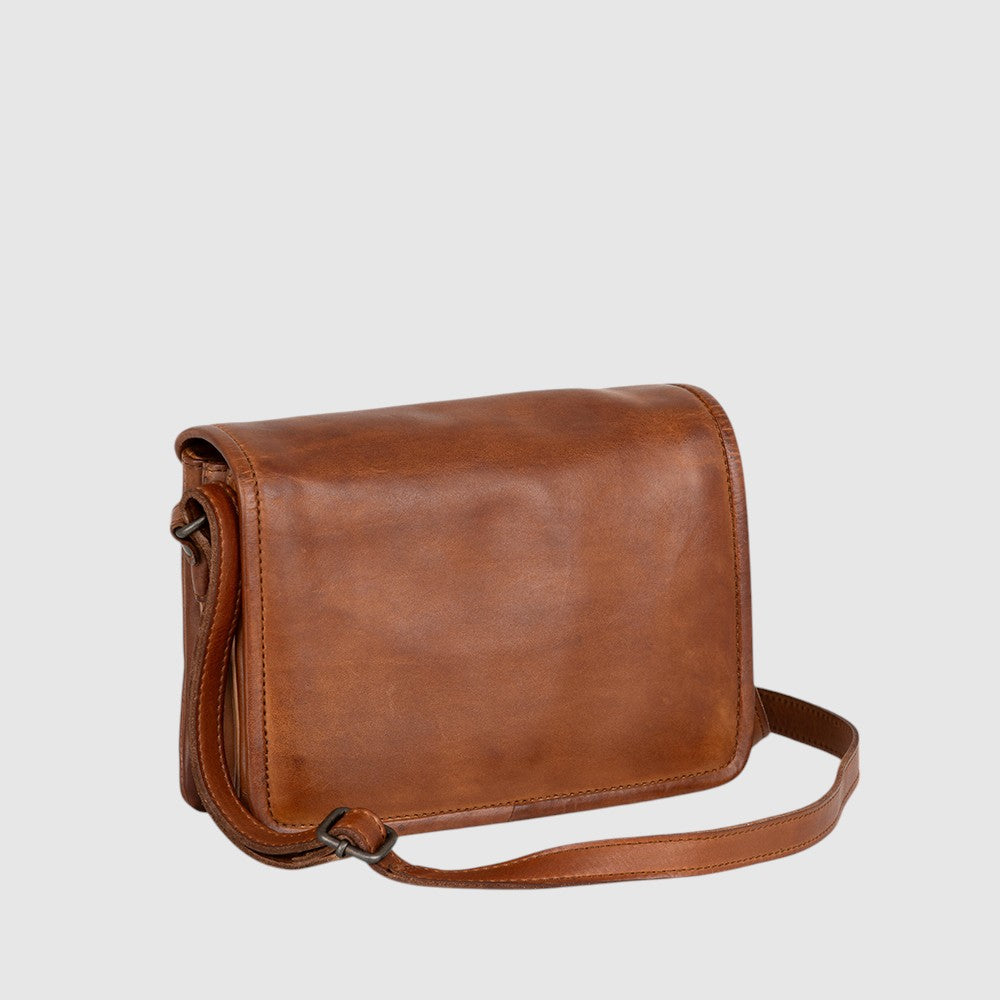 Introducing The Trend 22569 crossbody bag, the perfect blend of function and fashion for your daily routine. Stay organized with plenty of pockets and enjoy hands-free convenience with adjustable and removable straps. Be stylish and stay organized with this ultimate companion for any occasion!