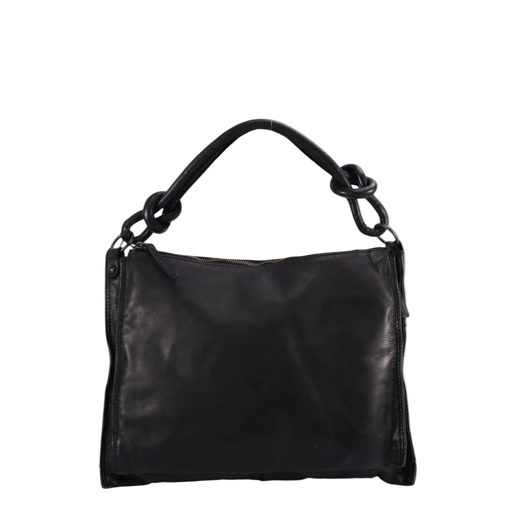 The Trend 22788 handbag combines understated elegance with practical versatility. Crafted with premium leather, this bag keeps your belongings protected while maintaining a refined silhouette. Perfect for everyday wear, this handbag pairs effortlessly with any wardrobe, delivering both style and functionality.