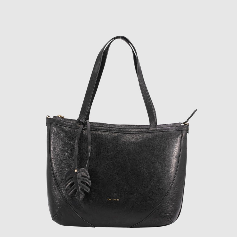 Meticulously crafted in Italy from the finest genuine Italian leather, The Trend 4756494 bag exemplifies refined craftsmanship and practical design. Its secure zip closure safeguards your essentials, while the interior thoughtfully includes one zipped pocket and two additional unzipped compartments for meticulous organization of smaller items. The smooth, black leather exterior merges timeless style with durable quality, making it a versatile accessory for any wardrobe. 