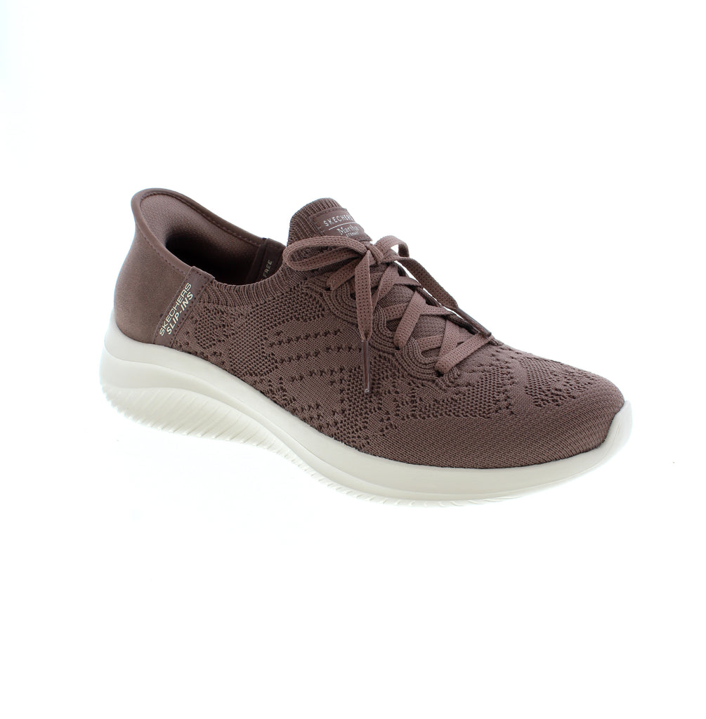 Experience ultimate comfort and style with Skechers Martha Stewart Slip In's. Designed with the exclusive Heel Pillow™ and Air-Cooled Memory Foam® insole, these vegan slip-ons provide all-day cushioning and support. The crochet knit Stretch Fit® upper adds a touch of elegance to this versatile shoe collaboration with lifestyle expert, Martha Stewart.