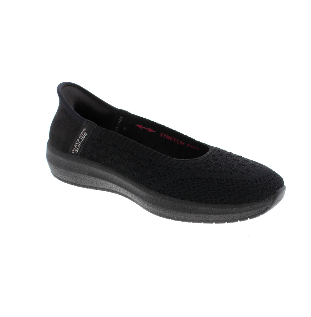 The Skechers Slip-Ins Cleo Swift Awe in Black combines comfort and style with its textured knit upper designed as a sleek skimmer. Featuring Slip-Ins technology, this shoe offers an easy slip-on fit with a flexible stretch design that adapts to your foot shape for all-day wear. The air-cooled memory foam insole provides breathable cushioning, keeping your feet comfortable and fresh throughout your activities. Crafted from machine-washable knit fabric.
