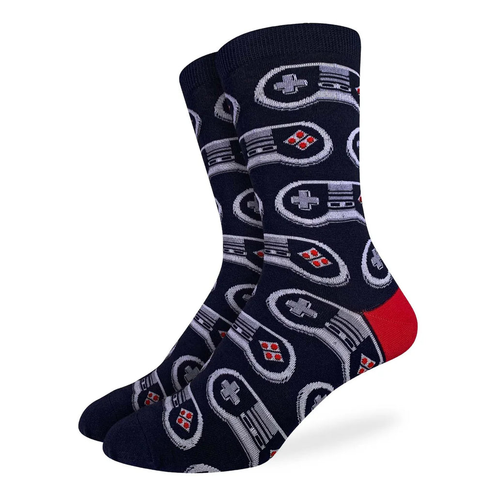 Crafted from a soft blend of 85% cotton, 10% polyester, and 5% spandex, the Good Luck Sock - Video Game Controller combines comfort, durability, and flexibility for an ideal fit. These socks are made to move with you, providing all-day comfort whether you're gaming or on the go. Maintenance is simple: machine wash cold at 30°C and avoid bleach or ironing to preserve their quality. For optimal longevity, line drying is recommended over tumble drying. 