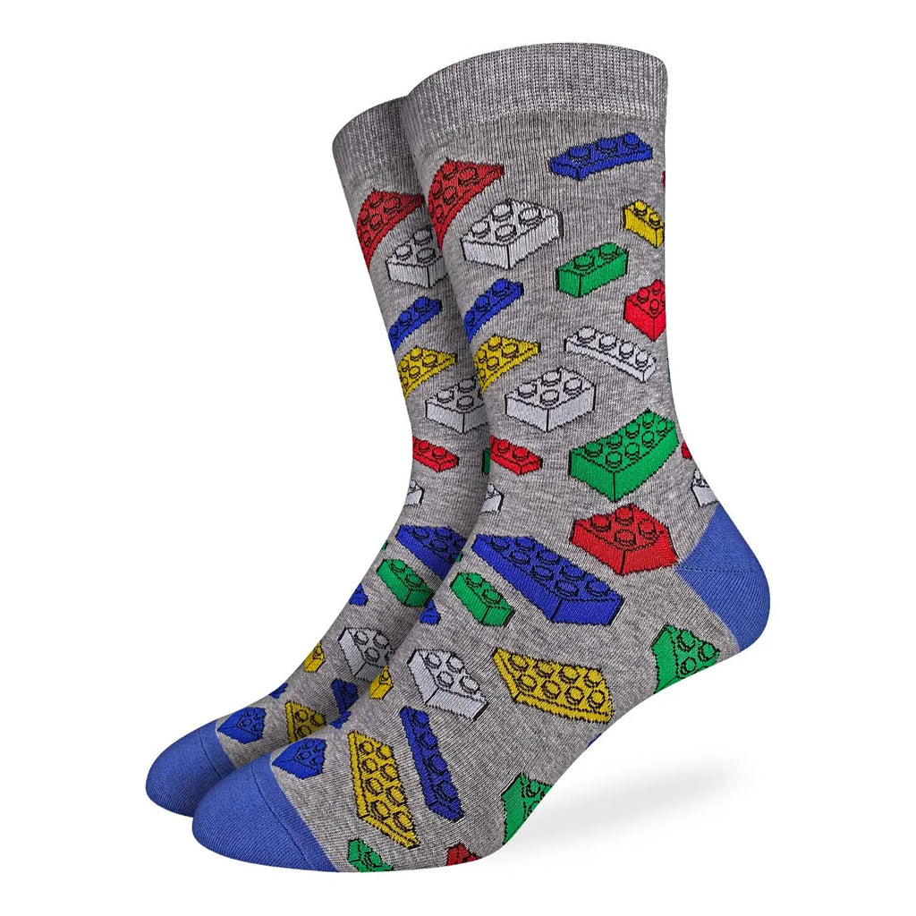 Made from a cozy blend of 85% cotton, 10% polyester, and 5% spandex, the Good Luck Sock - Building Blocks combines softness, durability, and flexibility for exceptional wear. These socks move naturally with your feet, ensuring comfort that lasts all day long. Featuring a charming building blocks pattern, they bring a playful vibe to your daily attire without sacrificing practicality. Caring for them is simple: machine wash cold at 30°C, and avoid bleach or ironing to maintain their quality. 