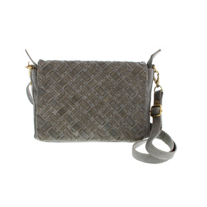 Milo Pessac in grey is a classic leather crossbody. Handwoven for durability, it has two interior sections and multiple pockets to ensure your essentials remain organized. With built-in credit card slots and ample room for your items, it's the perfect choice for anyone who needs extra storage and a hands-free way to stay on the go.
