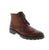Classic sophistication meets everyday versatility with the Johnston &amp; Murphy Cade Wingtip in tan. This timeless dress boot transitions seamlessly from the office to casual outings with its refined wingtip detailing and polished aesthetic. Crafted with a premium leather upper, leather lining, and leather footbed for lasting comfort and durability. The foam midsole provides cushioning support, while the rubber outsole delivers reliable traction. Lace-up entry ensures a secure, customizable fit.