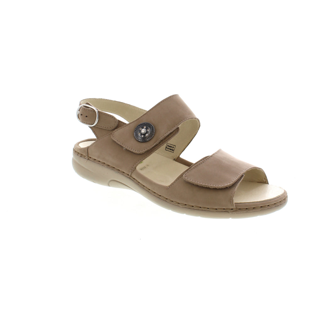 A must-have for warmer days, the Waldlaufer Gunna sandal offers effortless style and comfort. Its double velcro closure allows for easy on and off, while the lightweight PU outsole and regular width provide an optimal fit. Plus, the chic decorative button adds a fashionable touch.