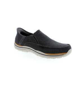 Explore a new level of comfort and style with Skechers Hands Free Slip-ins Relaxed Fit®: Expected slip-on. Crafted with our exclusive Heel Pillow™ technology, this vegan moc toe slip-on offers a canvas upper, twin gore panels, hands-free molded heel panel, and a Skechers Air-Cooled Memory® Foam insole for a truly comfortable fit.