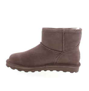 Stay stylish and protected this winter with our Bearpaw Alyssa ankle boot. Designed with a 5 inch height, it is perfect for showing off your socks or tights. Easy to slip on and off, it can also double as a cozy slipper. The BearCoat™ Rain & Stain Repellent provides extra protection against the elements, making it the ultimate winter essential.