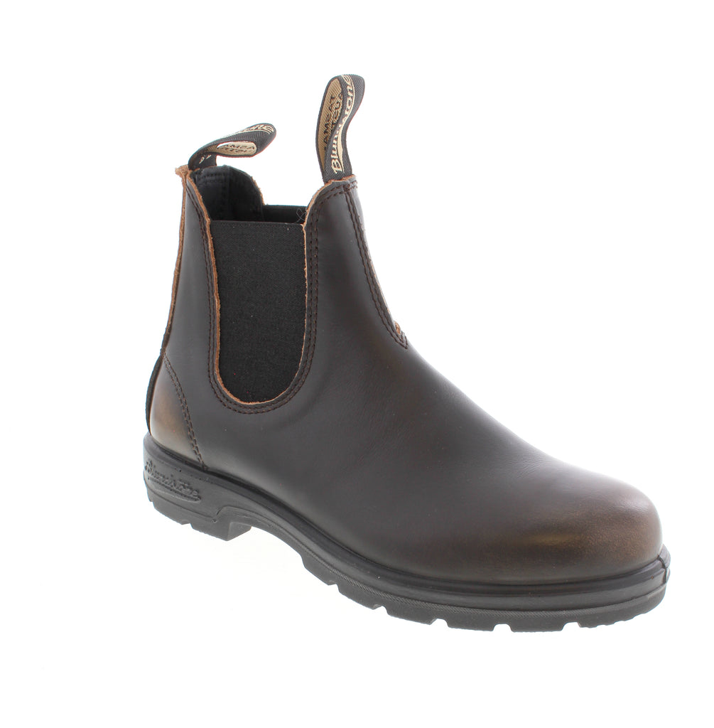 Timeless comfort meets rugged style with the Blundstone 2440 Classic Vintage Brown. This iconic Chelsea boot features a premium leather upper with water-resistant protection, designed to age beautifully while keeping your feet dry and supported. Built for all-day wear, the 2440 combines a cushioned microfiber footbed with an EVA midsole and shock-absorbent TPU outsole for reliable comfort on any surface. The removable insole accommodates custom orthotics.