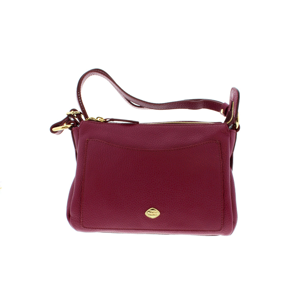 The Trend 2464248 bag makes a fashion statement in this beautifully designed bag. Complete with a front pocket, top zipper closure and a removable, adjustable strap, this bag pairs with every outfit!