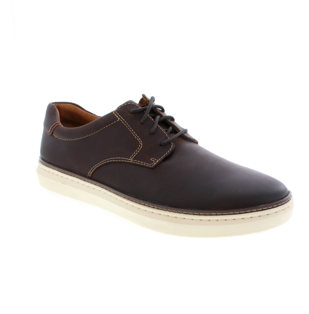 The McGuffey 2 Plain Toe from Johnston &amp; Murphy represents refined craftsmanship in versatile brown leather. Transition effortlessly from the casual to dress occasions. This shoe is an excellent additional to your wardrobe for everyday.