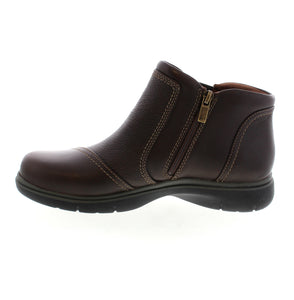 Clarks Certina Joy ankle boots are a perfect blend of fashion and comfort, providing your feet with all-day comfort. Made of leather, these shoes offer extended coverage with an elegant button and elastic gore panel design. Your feet will remain comfortable even during extended wear.