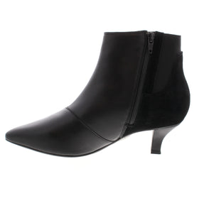 The Clarks Kepley Erin features a pointed toe for a sleek look. Its soft cushioning provides ultimate comfort whether you're dressing up for a date night or spending the day in the office. The flexible outsole and blend of leather and suede uppers make this ankle boot perfect for any occasion.