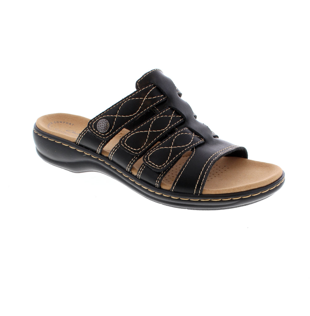 Effortless comfort meets everyday versatility with the Leisa Amanda by Clarks. Crafted from soft, durable leather, this strappy design features a cushioned footbed that keeps your feet comfortable whether you're heading to the beach, exploring town, or tackling daily errands.