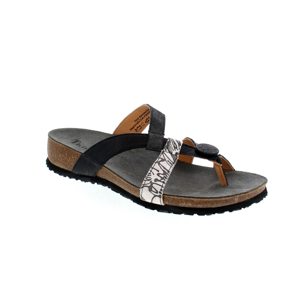 The Think! Julia 246 thong sandal is designed for maximum comfort. Its lightweight, airy materials and criss-cross foot straps provide greater stability and support, while the button leather detailing adds a stylish touch.&nbsp;