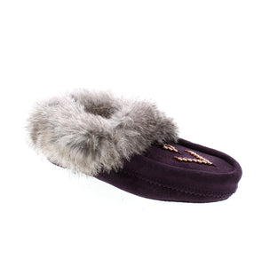 Experience comfort, style, and luxury with our best-selling Tipi Slippers. Crafted with soft, breathable suede and trimmed with fur, these moccasin-inspired slippers are perfect for lounging at home or at the cottage. The fleece footbed provides cozy warmth while the soft suede sole offers unparalleled comfort for years to come. Enjoy the best of both worlds with Tipi Slippers.