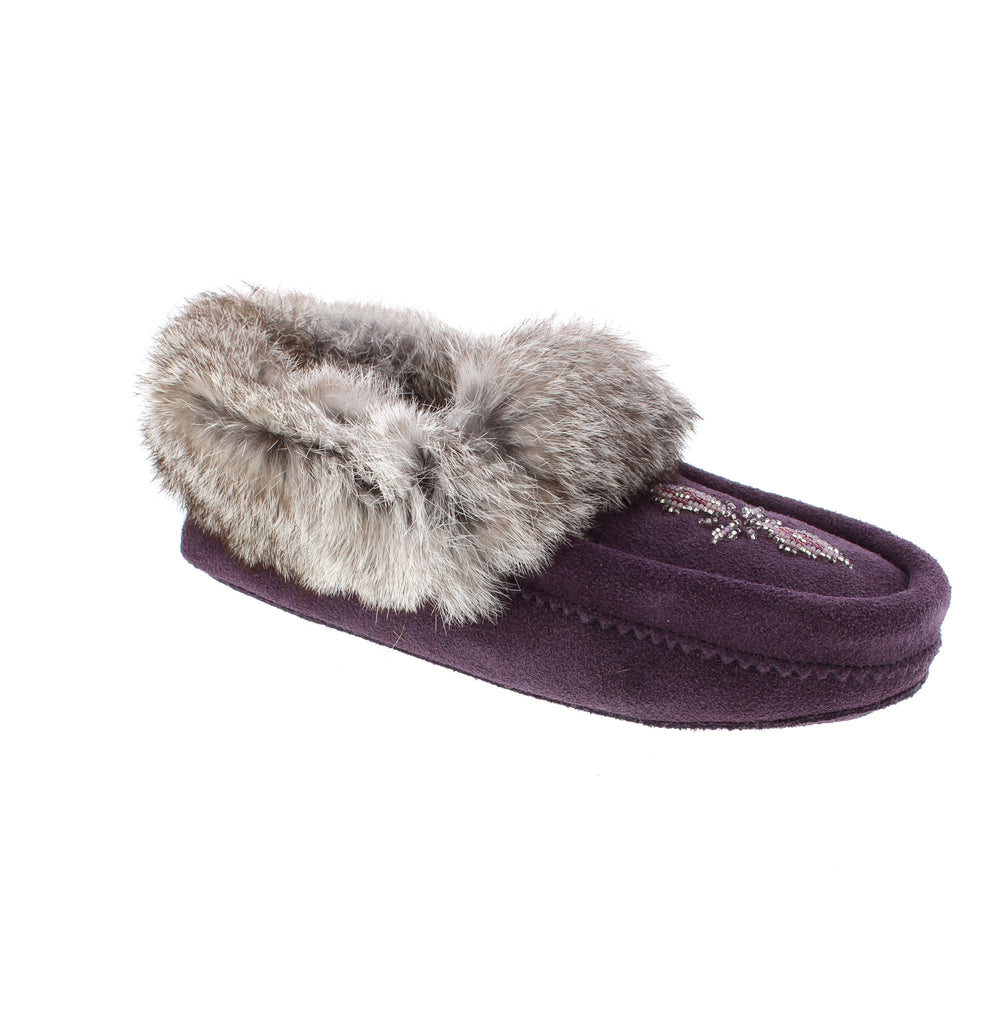 Experience comfort, style, and luxury with our best-selling Tipi Slippers. Crafted with soft, breathable suede and trimmed with fur, these moccasin-inspired slippers are perfect for lounging at home or at the cottage. The fleece footbed provides cozy warmth while the soft suede sole offers unparalleled comfort for years to come. Enjoy the best of both worlds with Tipi Slippers.
