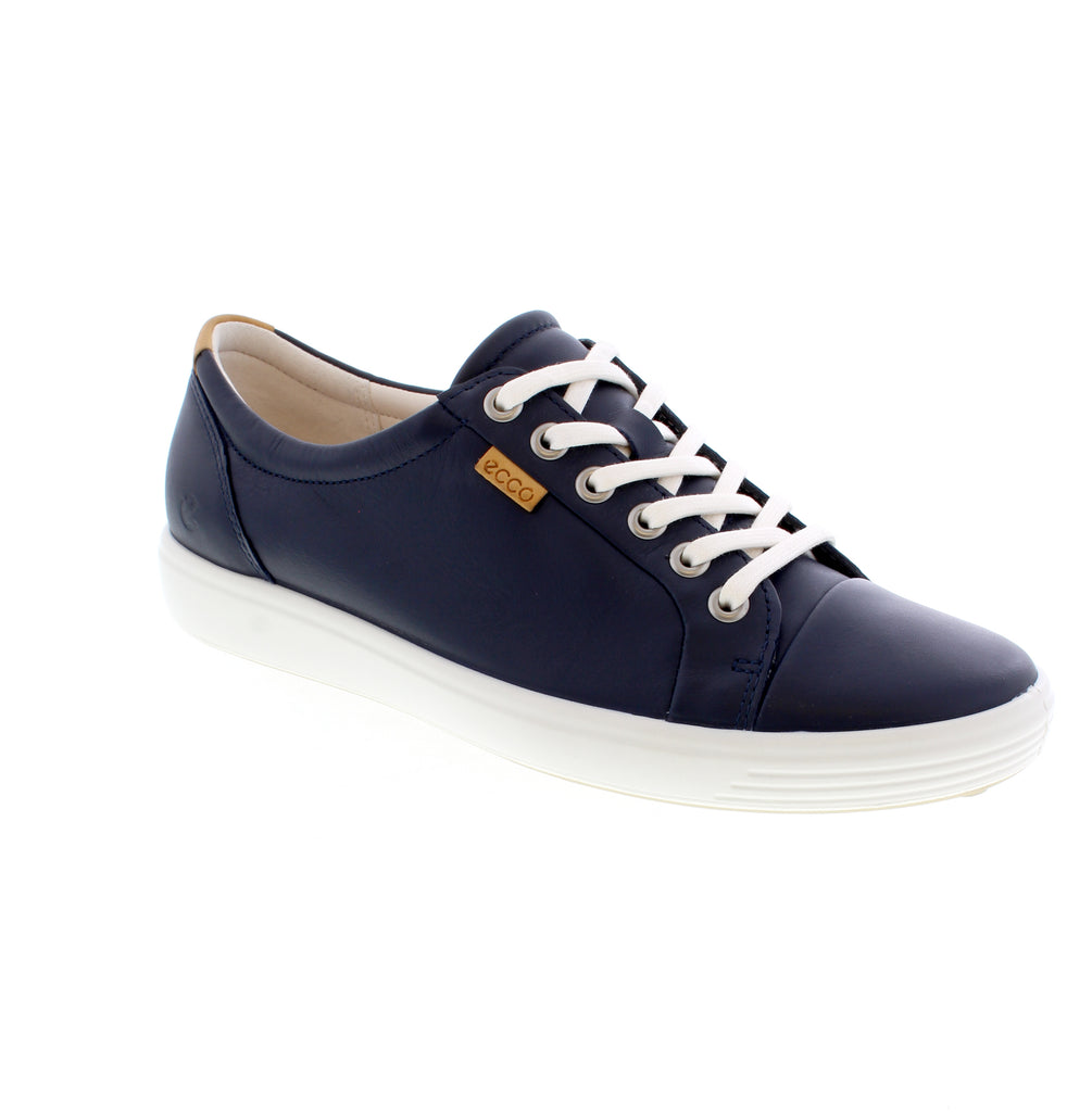 Effortless comfort meets timeless style with the ECCO Soft 7 Sneaker in navy. This versatile leather sneaker transitions seamlessly from casual outings to athleisure moments. Leather upper, lining, and footbed deliver durability and breathability. The removable insole accommodates custom orthotics, while the EVA midsole and TPU outsole provide responsive cushioning and reliable traction. Lace-up entry ensures a secure fit.