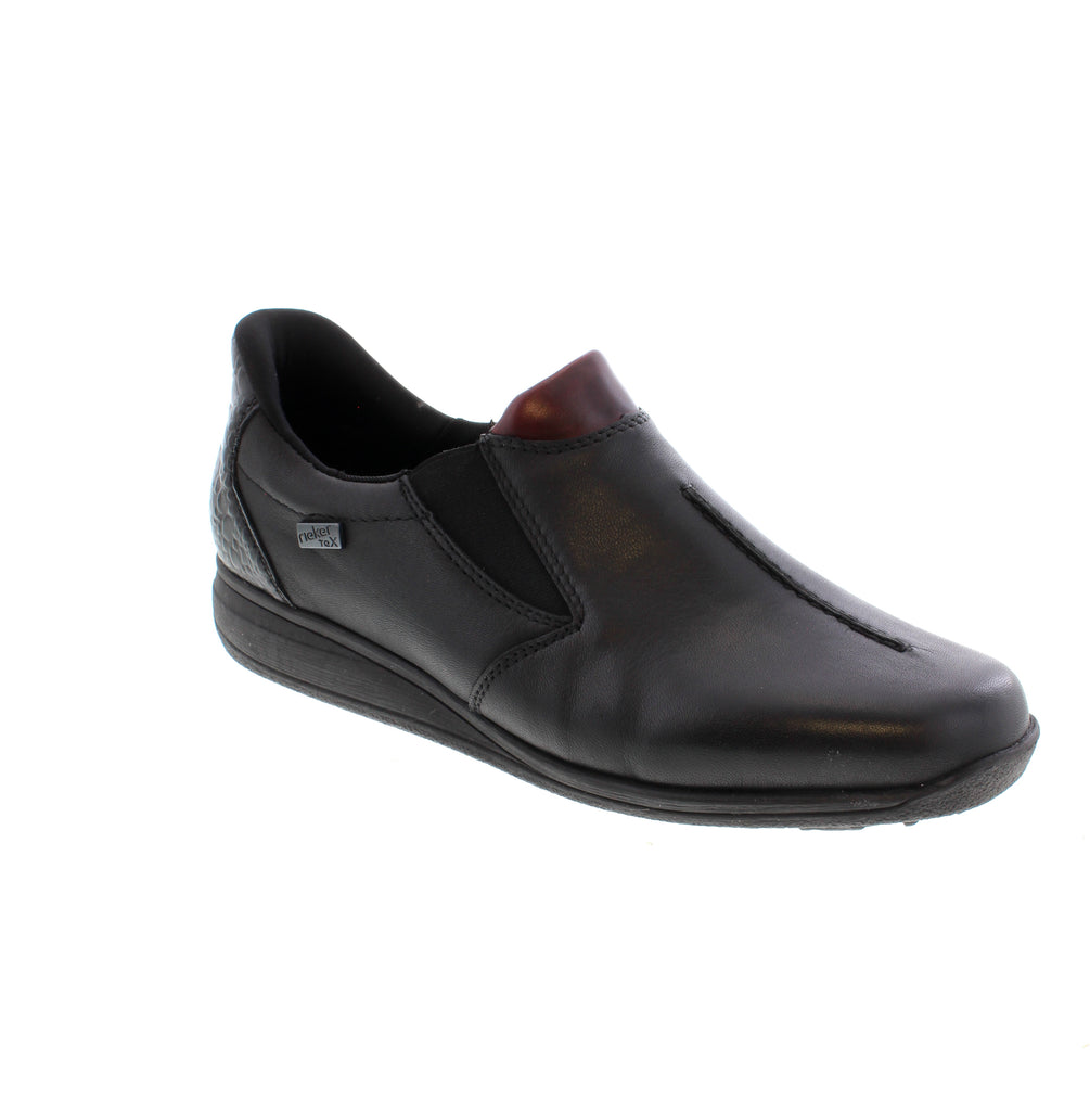 Experience unmatched comfort and style with the Rieker 47253-00 in black smooth leather. Designed to fit like a glove with an elastic band, these shoes offer extra width for spacious wear. The padded, removable insole feels like a holiday for your feet, while the grippy sole ensures stability on any surface.