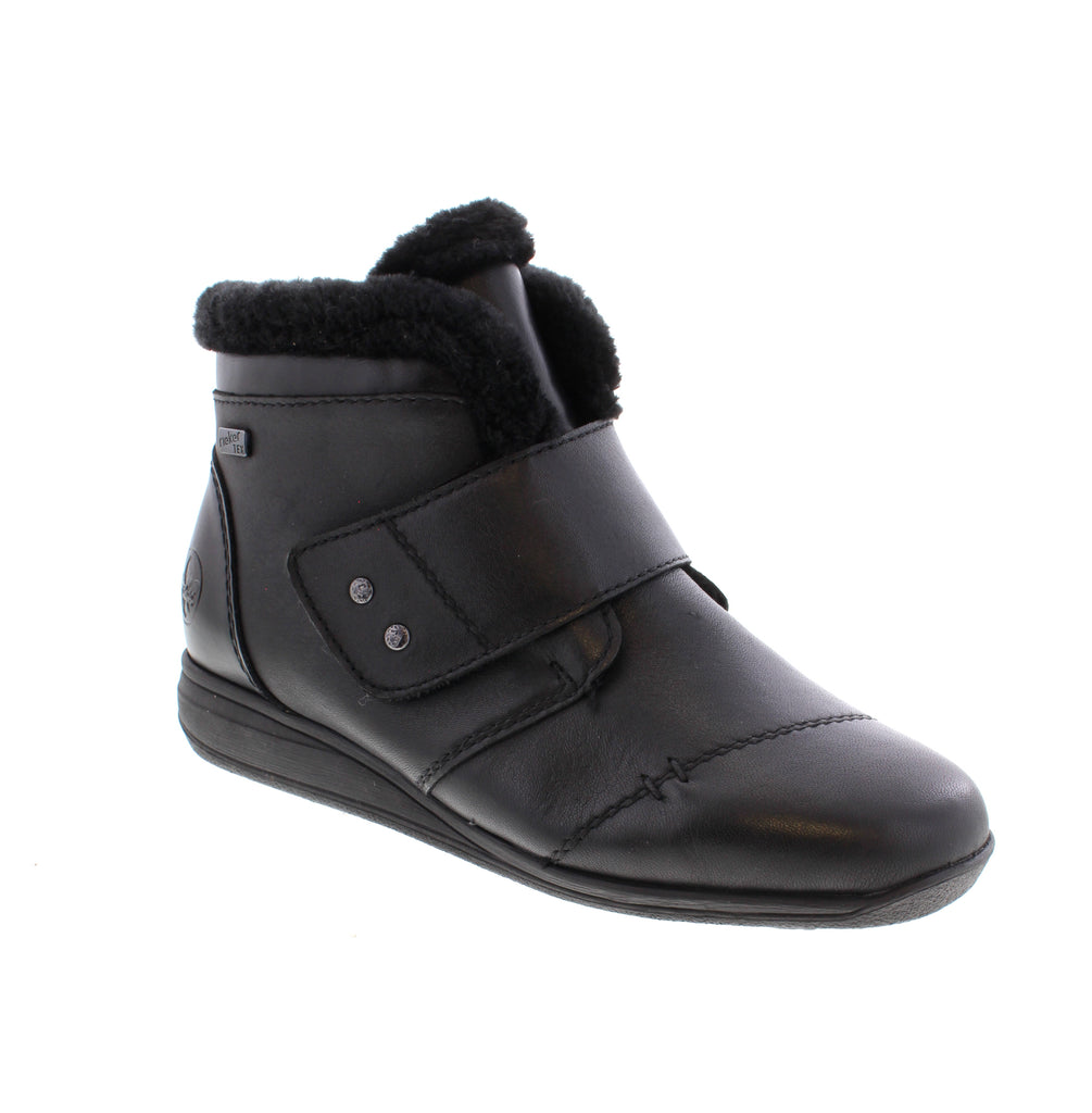 Rieker's 47268-00 bootie combines comfort and style for everyday wear. This black ankle boot features a leather upper with water-resistant protection, fleece lining, and an insulated design to keep your feet warm through casual outings and outdoor adventures. Designed with a removable microfiber footbed and foam midsole for cushioning, this bootie offers orthotic-friendly support. The rubber outsole with velcro adjustment ensures a secure, customizable fit.