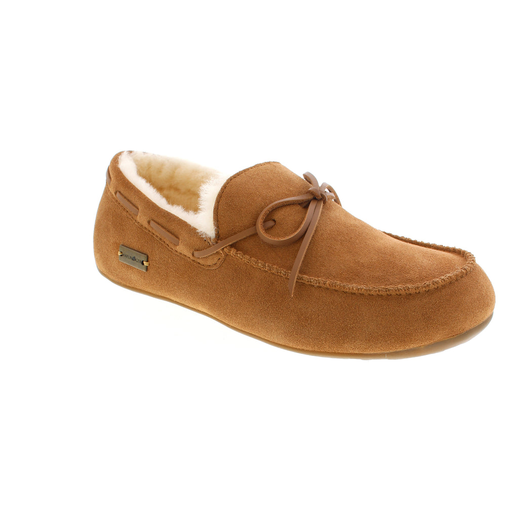 Haflinger's Yumah slipper combines comfort with timeless style. Crafted in Germany, this slip-on features a soft suede upper, cozy sheepskin lining, and a durable rubber outsole for everyday wear. The orthopedic corrective arch support and curved footbed provide exceptional comfort for all-day wear, while the foam midsole cushions every step. Perfect for lounging at home or quick errands.