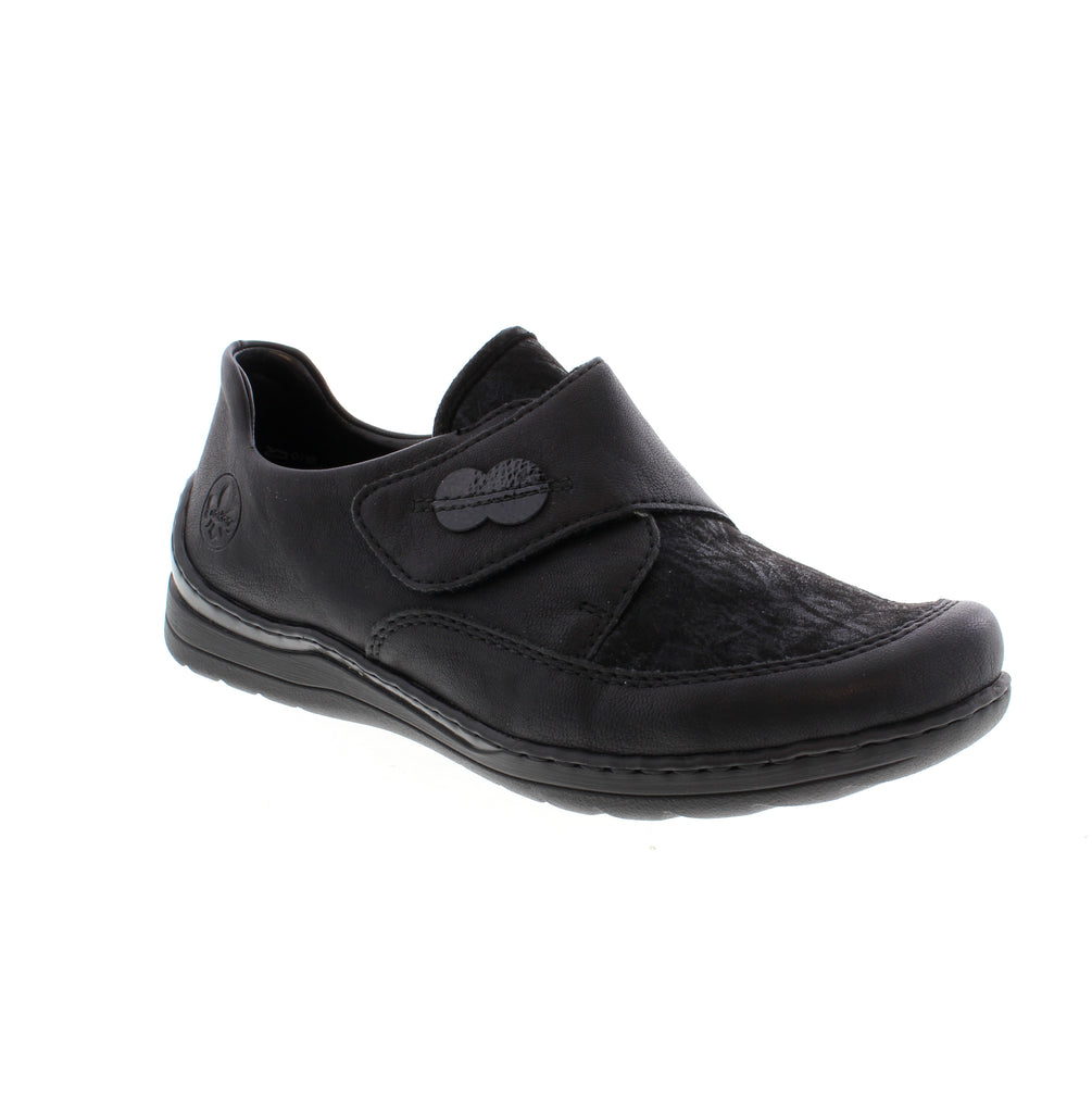 Step out in style and comfort with the Rieker 48954-00. Its traditional stitchdown construction ensures flexibility and durability for a perfect fit. The convenient velcro fastener makes putting on and taking off effortless. Enjoy all-day comfort thanks to the shock-absorbing, lightweight sole and extra soft cover sole. Designed with extra width, these shoes provide ample room for your toes, allowing natural movement without compromise. Ideal for any occasion, these shoes combine practicality with modern st