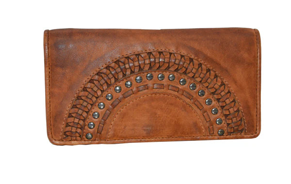 Handmade in washed cowhide, this Milo wallet immediately screams statement piece! Large enough to fit your cell phone, zippered pockets for security, and multiple slots for holding cards, you're never going to want to leave home without it!