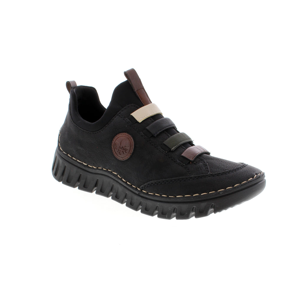 Effortless comfort meets everyday style with the Rieker 57550-00. Crafted with a man-made leather upper and supportive foam midsole, this versatile shoe delivers all-day wearability for women seeking a reliable casual essential.