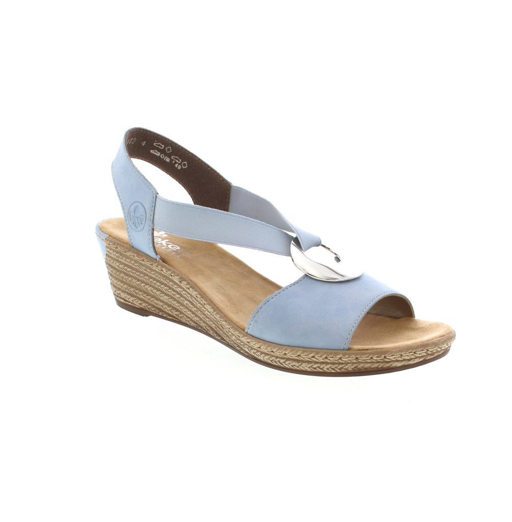 Style harmonizes with utility in these blue Rieker wedge sandals, offering sophisticated design alongside exceptional comfort and practicality. The meticulous stitchdown construction ensures durability while maintaining remarkable flexibility at the upper-sole junction. The integrated elastic band provides a precise, customized fit. Featuring a lightweight, impact-absorbing sole with an elegant wedge heel, these sandals deliver sustained comfort throughout extended wear.