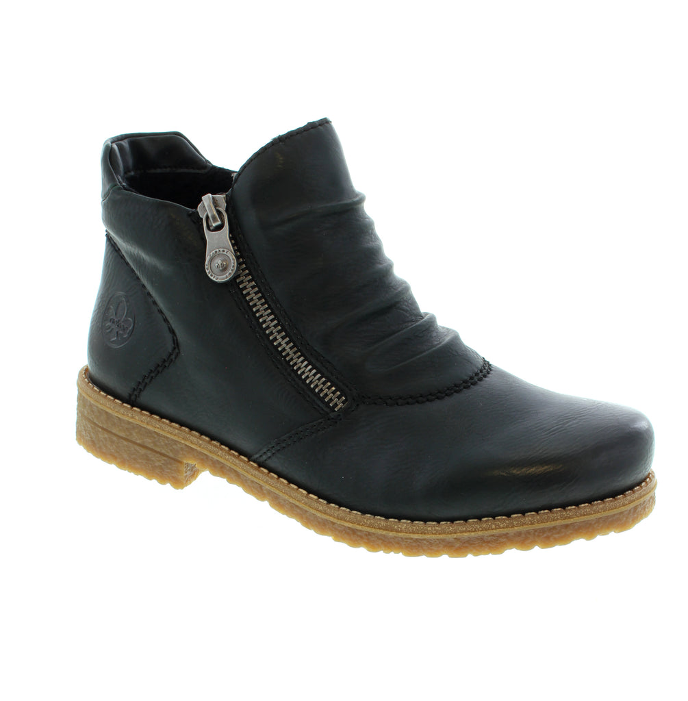 Step out in style and comfort with the Rieker 73553-54 ankle boots. Featuring a convenient zipper for easy wear, these boots showcase eye-catching ruching detail that adds a unique touch. Their grippy sole ensures secure footing, while the extra-soft cover sole delivers exceptional comfort all day long.&nbsp;