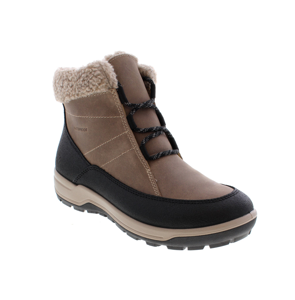 Lightweight and weather-ready, the Ecco Trace Lite WP combines waterproof protection with everyday comfort. This versatile ankle boot handles casual outings and outdoor adventures with equal ease. Waterproof upper keeps feet dry in wet conditions. Fleece lining adds warmth without bulk. Microfiber footbed provides cushioning support. EVA midsole delivers responsive comfort. Rubber outsole with traction grip ensures stability on varied terrain.