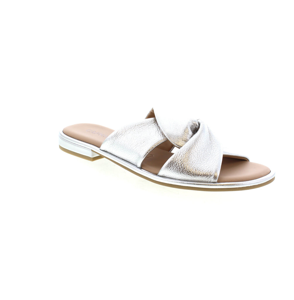 Caprice 9-27100-42 slip-on sandals showcase stylish criss-cross straps, making them ideal for warm weather wear.