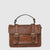 Crafted from premium Italian genuine leather, this tan leather bag blends refined style with functional design. Its spacious main compartment secures belongings with a reliable zip closure, while internal zipped and open pockets offer organized storage for smaller essentials. The removable crossbody strap adds adaptable wear options, making it suitable for various occasions. Proudly made in Italy, this bag exemplifies superior craftsmanship and enduring elegance.