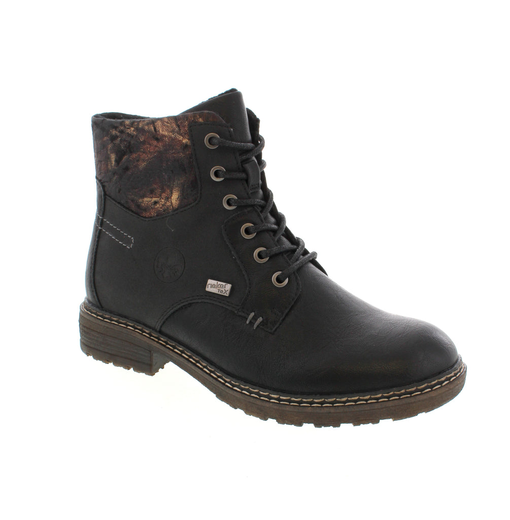 Experience effortless comfort with these black Rieker 94712-00 lace-up boots. Designed for easy walking and everyday wear, they combine practical lacing with a convenient zipper for a perfect fit. The unique multi-coloured pattern on the shaft adds a stylish touch, while the grippy sole ensures reliable support. Featuring a water-repellent RiekerTEX membrane, these boots keep your feet comfortable even in wet, cold conditions. Ideal for those who value both function and flair in their footwear.