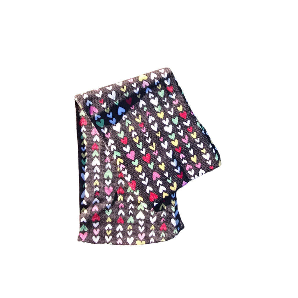 Elevate your outfit with the Celeste Stein Anklet Socks - Heart Strings. Crafted from a comfortable blend of nylon and spandex, these socks offer the perfect balance of stretch and durability. Designed to seamlessly complement everything from sleek dress pants to casual jeans, they add a subtle touch of charm to your look. Their anklet length ensures comfort and versatility, making them an ideal choice for everyday wear. 