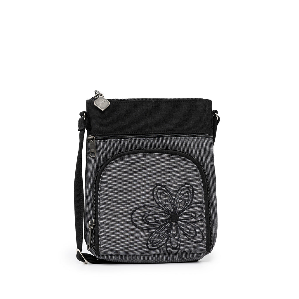 Stay organized with Jak's Grab and Go Pouch. This walking pouch features a convenient organizer pocket for storing cards, cash, and personal items. The adjustable shoulder strap makes it perfect for everyday use. Add a touch of style with the embroidered flower design.