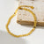 Hackney Nine Alala LG - Gold