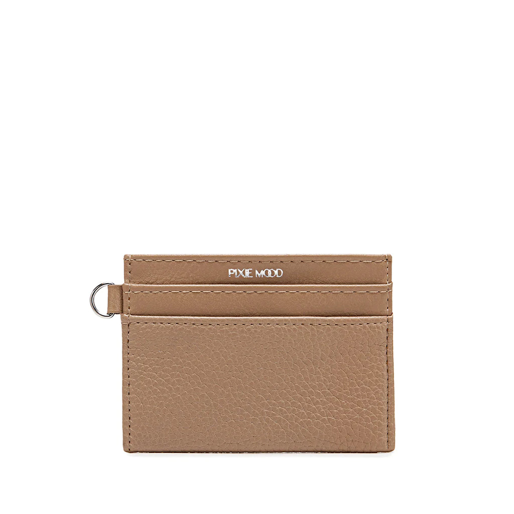 The Pixie Mood Alex card holder wallet has four card slots and a top slot for additional cards or cash, this everyday essential brings convenience and efficiency in one sleek design. Keep your essentials organized and easily accessible with this must-have accessory.