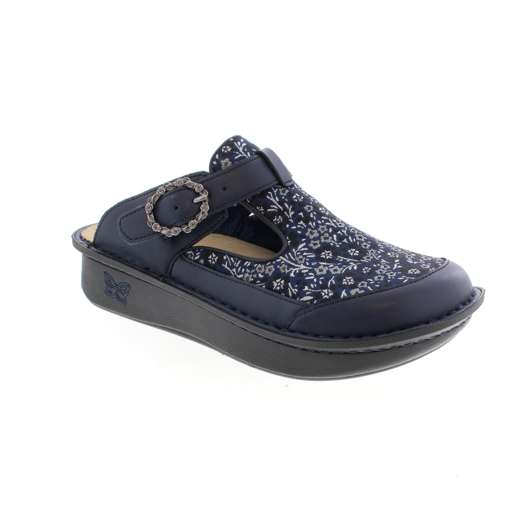 Alegria Classic Navy Print clog combines comfort with everyday style. Features a fabric upper, removable insole, and rocker bottom heel for all-day ease. Fits true to size with average width and reinforced arch support. Perfect for casual wear.