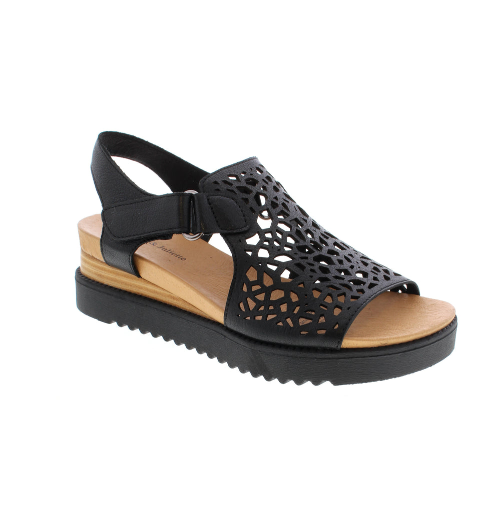 Django & Juliette's Ansh sandal delivers effortless elegance for warm-weather dressing. Crafted from premium leather, this style features a secure velcro closure for adjustable comfort throughout the day. The versatile black color transitions seamlessly from casual outings to dressier occasions.&nbsp;