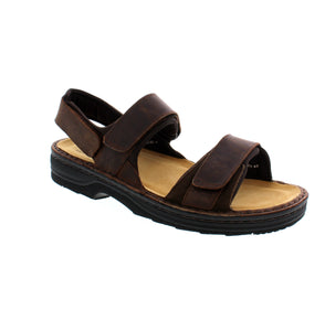 Experience ultimate comfort and support with the Naot Arthur SCN sandal. Made with an adjustable strap design and a suede-wrapped cork footbed, this sandal molds to your foot for a custom fit. Featuring a lightweight and slip-resistant sole, it's perfect for all-day wear. Plus, it's APMA accepted for promoting good foot health.