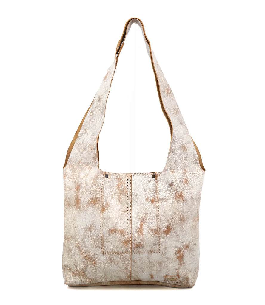 Introducing the Bed Stu Ariel Mid.  This leather shoulder bag has cutout shoulder straps and a strong magnetic closure.  Handmade for character that deepens in time.
