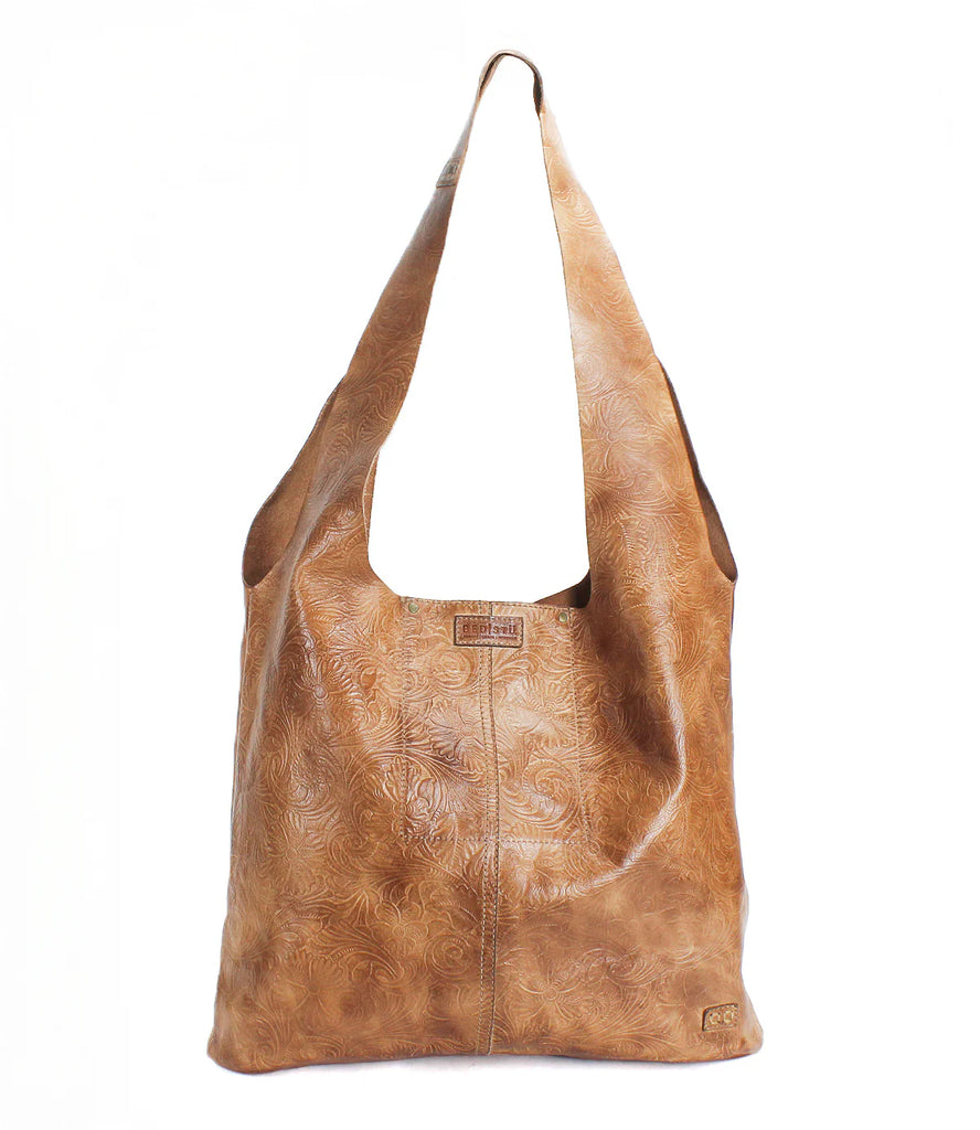 Ariel EM by Bed Stu is a limited-edition shoulder bag with embossed leather. The wide strap ensures comfortable wear, while the magnetic clasp provides added security. Designed to be versatile and stylish.
