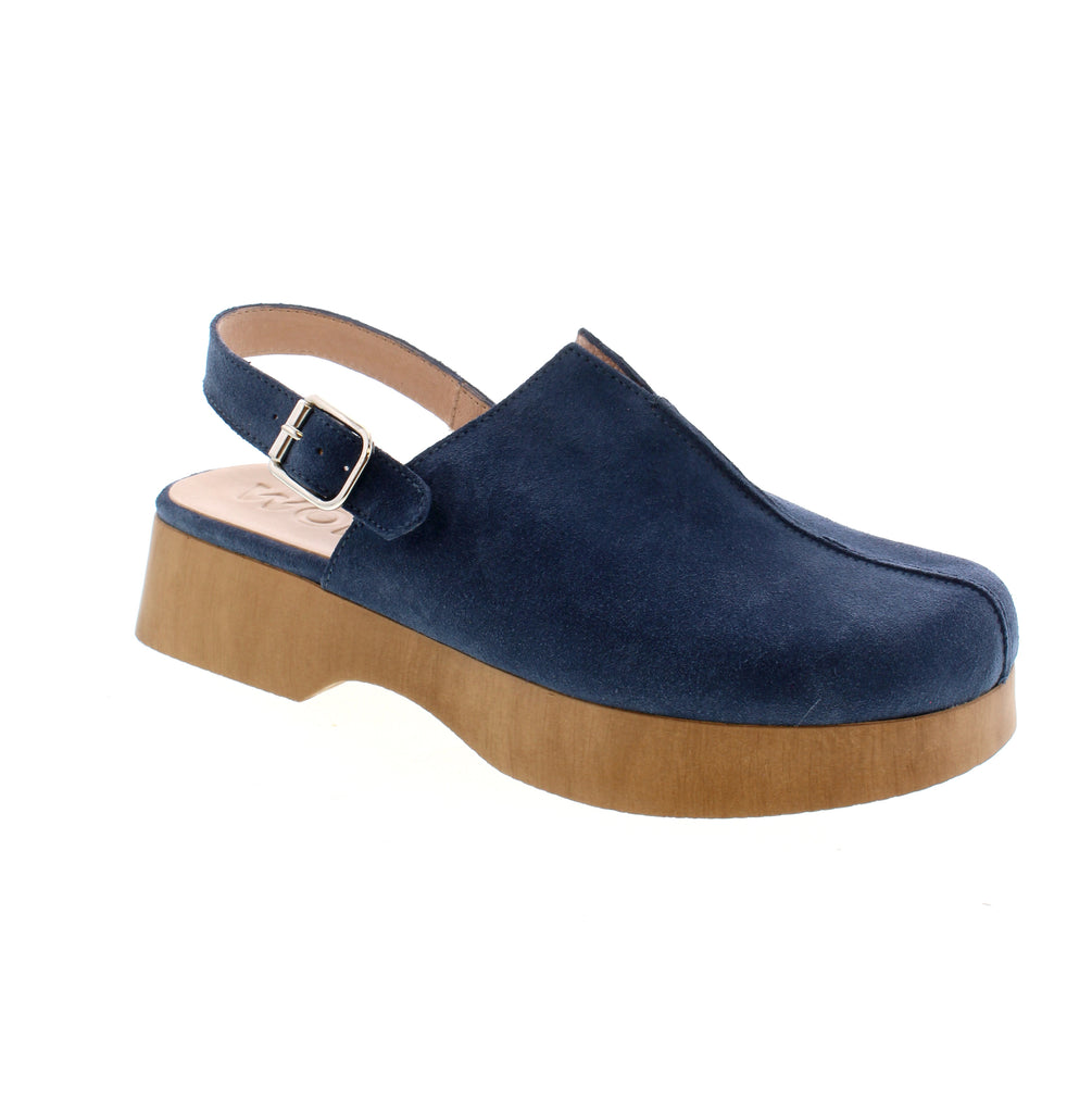 Discover comfort and style in the Wonders B-8501 casual back strap clog. Crafted with a suede upper and wood-toned PU sole, it features a V-cut notch on the instep for easy slip-on and front seam detailing for added style.