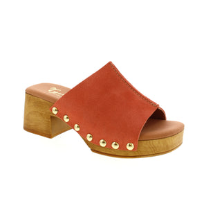 Step back in time with the Tyche Bella clogs. These 70's-inspired clogs feature suede uppers, an open-toe design, and a well-cushioned footbed for ultimate support and comfort. Crafted in Turkey with a molded wood platform, these clogs mix retro fashion and modern comfort.